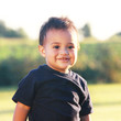 Cute baby smiling outdoor portrait