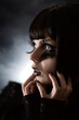 Photo en ligne au meilleur prix Portrait of strange girl with creative make-up and artificial ey