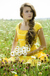 Foto: Beautiful girl in green field Beautiful girl in green field