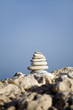 Stone pyramid on blue sky background Stone pyramid on blue sky background