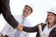 Handshake at a construction site