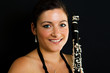 Cheerful clarinetist women