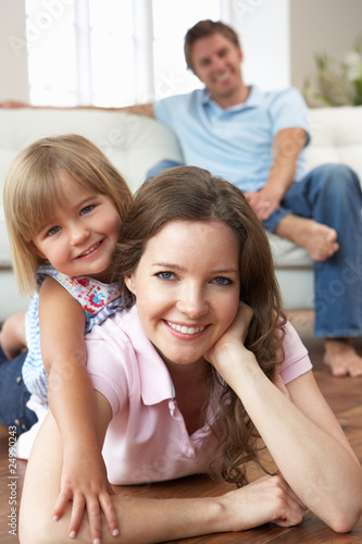 Portrait Of Happy Family Relaxing At Home Portrait Of Happy Family Relaxing At Home