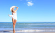 Young woman standing on a beach