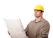 Worker with plans