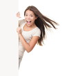 Sign woman peeking on side of blank billboard Sign woman peeking on side of blank billboard