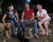 Family at campfire in the garden