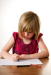 child drawing with crayons