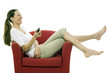 Photo: woman sitting on a chair with a remote control woman sitting on a chair with a remote control