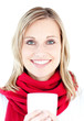 Portrait of a smiling woman holding a cup in the winter Portrait of a smiling woman holding a cup in the winter