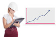 woman signing a document and business graph
