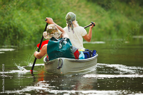 Photo: People boating on river People boating on river
