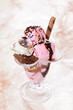Close up of nicely garnished icecream in a glass cup