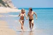 Foto: Happy couple running on each Happy couple running on each