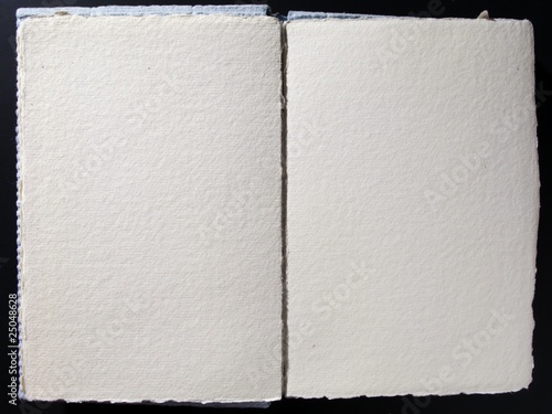 Photo: Blank book whith empty pages ready to be filled with text Blank book whith empty pages ready to be filled with text