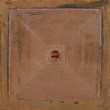 rusty metal square shaped seal for a sewer pit