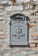 Postbox on brickwall.