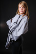Young woman in a large male shirt