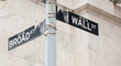 Wall Street road sign in the corner of New York Stock Exchange Wall Street road sign in the corner of New York Stock Exchange