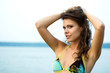 Beautiful young woman in bikini relaxing