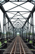 The railway bridge through the river of Thailand