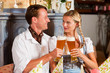 Bavarian Couple drinking wheat beer