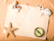 old paper and compass on sand background old paper and compass on sand background