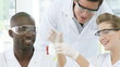 smiling chemists during analysis