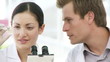 Two chemists busy with a Probe