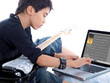child learning to create digital music