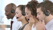 Helpful Business team with headsets on