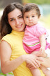 Mother with little daughter closeup