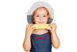 little girl eating corn