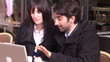 Video: man presenting his project to businesswoman in a cafe man presenting his project to businesswoman in a cafe