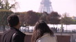 tourists looking at the Eiffel tower