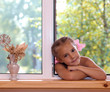 A girl in the window.