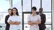 Determinded Business team standing with arms folded with ceo