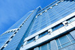 perspective view to blue business glass modern panoramic skyscra