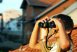 Boy with binoculars