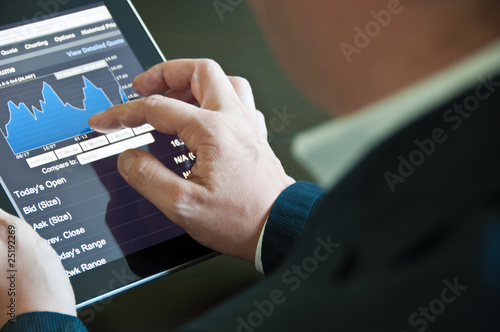Foto: Businessman with digital tablet PC Businessman with digital tablet PC