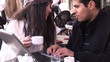 Video: hispanic couple working on laptop in a cafe hispanic couple working on laptop in a cafe