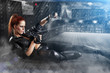 beautiful sexy girl holding gun . smoke background