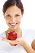 Health concept - Woman with a red apple in hand on white
