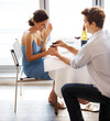 Young man propose marriage to beautiful girl in a restaurant