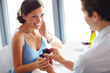 Young man romantically proposing to his pretty girlfriend