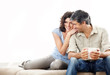 Foto: Happy mature couple on couch - Copyspace Happy mature couple on couch - Copyspace