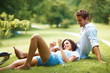 Romantic young couple relaxing in park