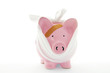 piggy bank with bandage on white piggy bank with bandage on white