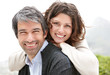 Young woman embraces her beloved husband - Outdoor Young woman embraces her beloved husband - Outdoor