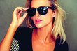 Portrait of pretty young female in sunglasses Portrait of pretty young female in sunglasses